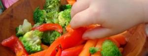 Kids eating vegetables