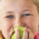 Girl eating an apple