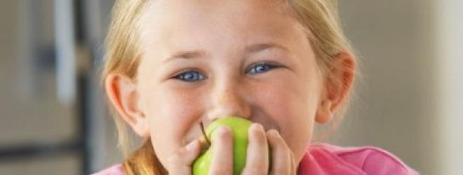 Girl eating an apple