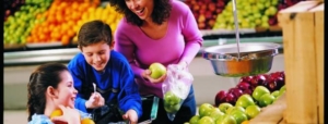 Mom with kids in supermarket