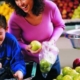 Mom with kids in supermarket