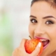 Woman eating apple