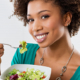 Woman eating salad