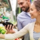 Couple shopping fruits and veggies